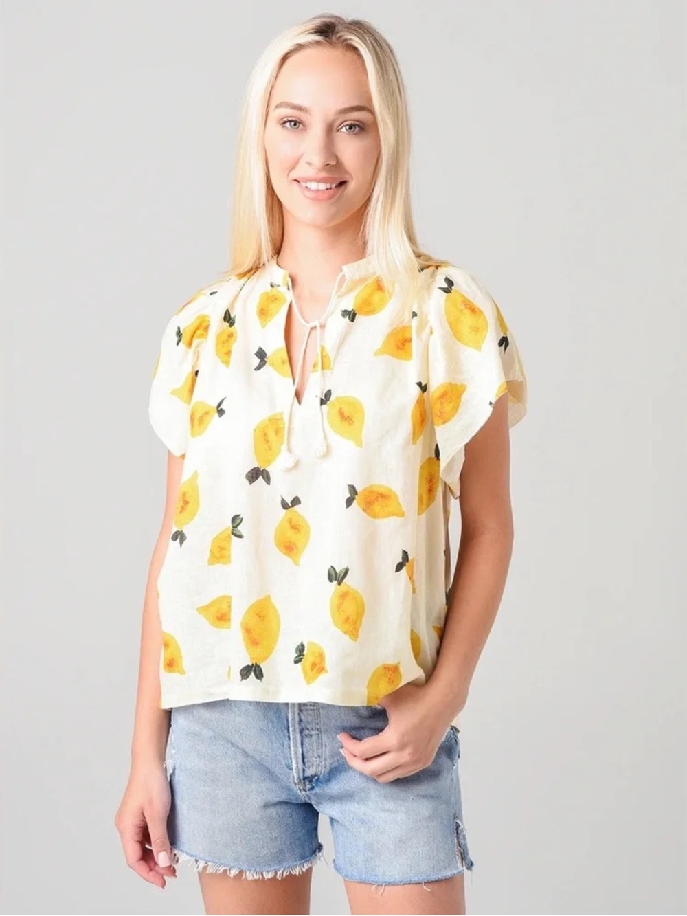 Trovota Birds of Paradise Brett Flutter Short-Sleeve Lemon Top Relaxed Fit